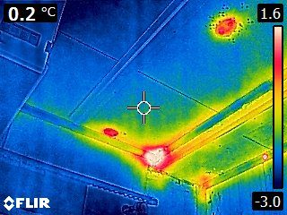 Thermal image showing multiple leak points at corner